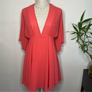 Low cut flowy dress with sleeves